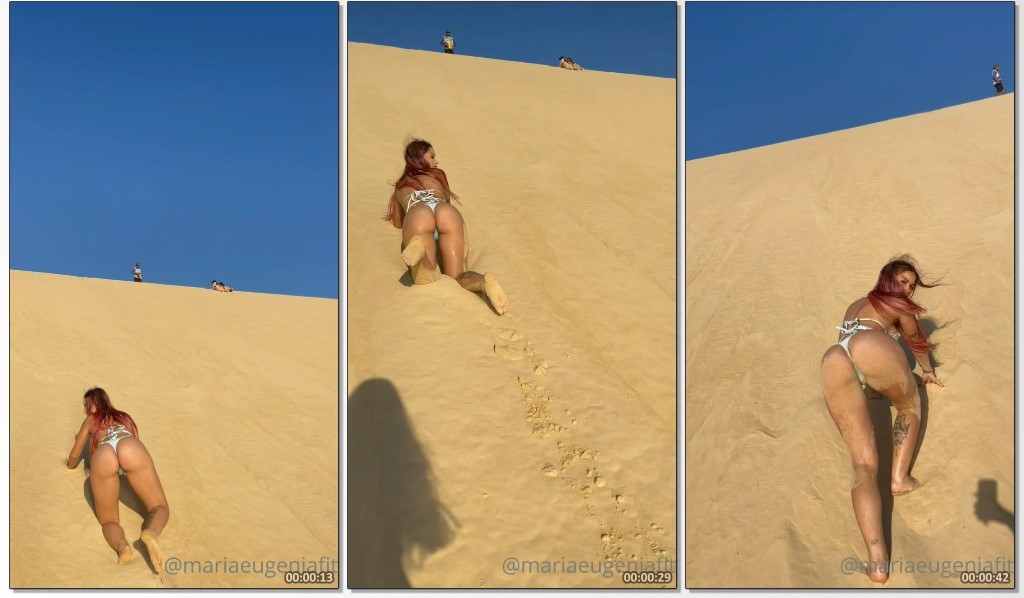 Maria Eugênia arrasando com sua sensualidade ao subir as dunas devagar e com tudo em destaque
