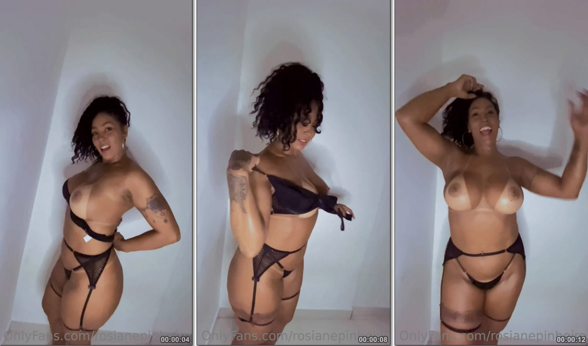 Rosiane Pinheiro fazendo um strip sensual no onlyfans com um olhar provocante