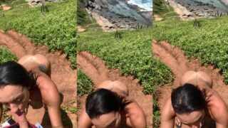 Mulher ousada do Casal Tk fazendo um boquete no marido na praia de nudismo