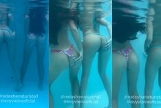 Evy Vieira e Natasha Naturalista sem roupa na piscina ajustando o biquíni de forma provocante